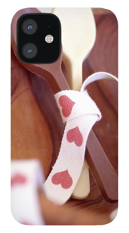 Holiday iPhone 12 Case featuring the photograph Chocolate Spoons Tied With Ribbon by Luka