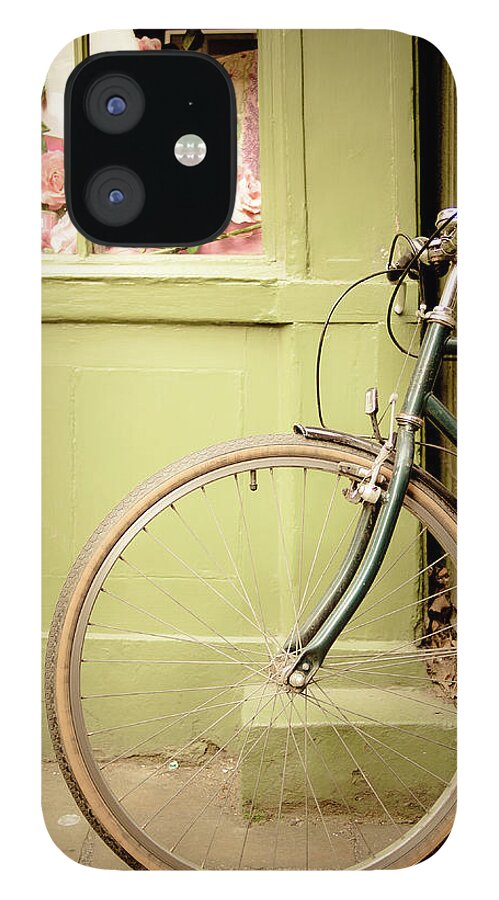Handlebar iPhone 12 Case featuring the photograph Classic Green Bicycle Against Green Wall by M. Ivkovic - Bangphoto.co.uk
