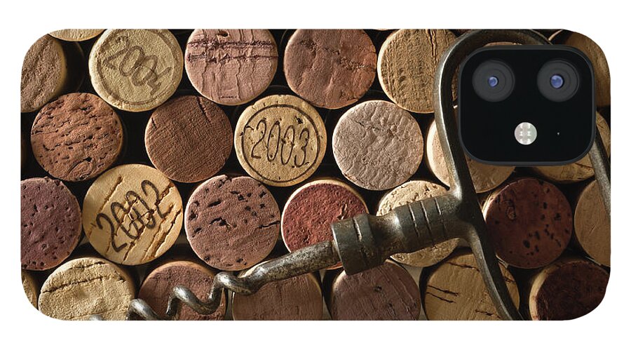 Corkscrew iPhone 12 Case featuring the photograph Corks And Corkscrew by Markswallow