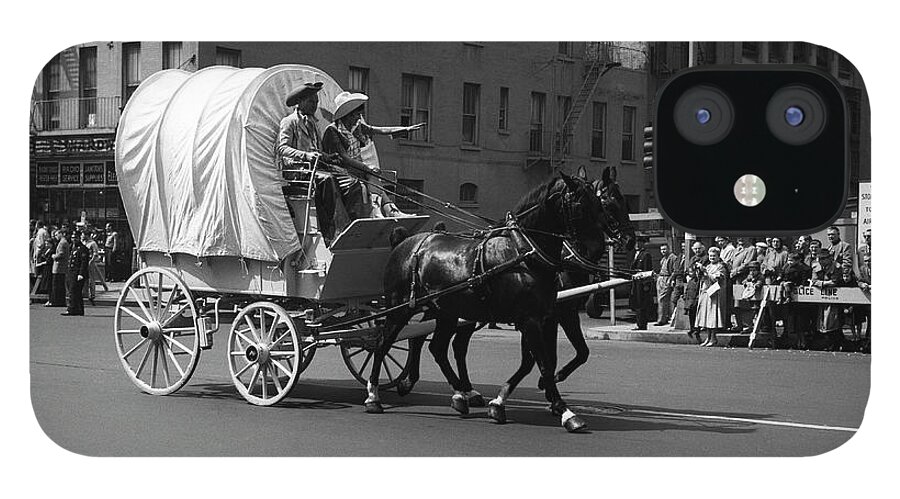 Working Animal iPhone 12 Case featuring the photograph Covered Wagon On Street During Parade by George Marks