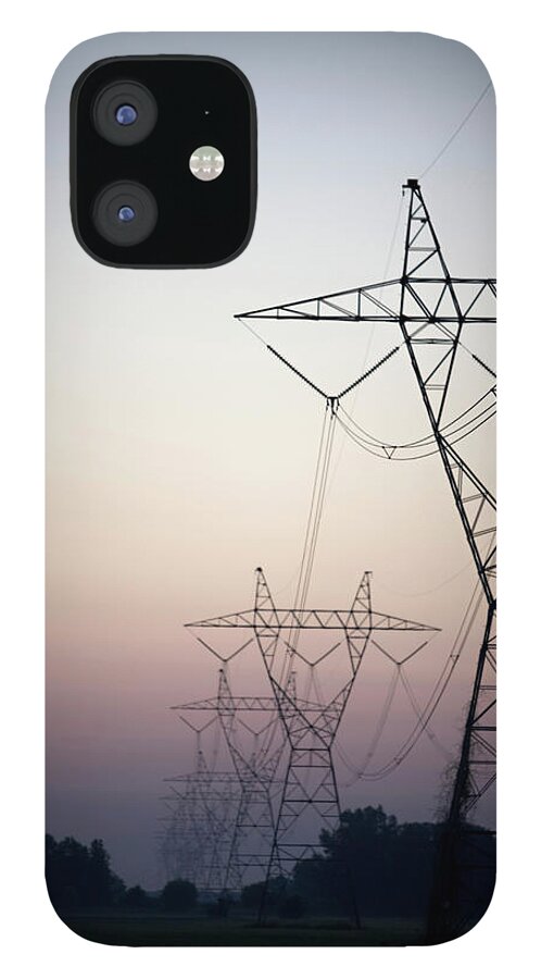 Tranquility iPhone 12 Case featuring the photograph Electrical Power Lines Against The by Wesley Hitt