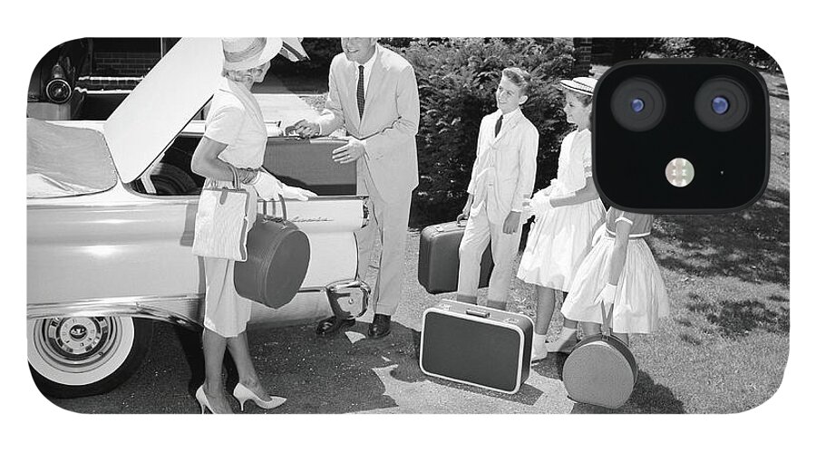 Mid Adult Women iPhone 12 Case featuring the photograph Family Packing Suitcases In Trunk Of by H. Armstrong Roberts