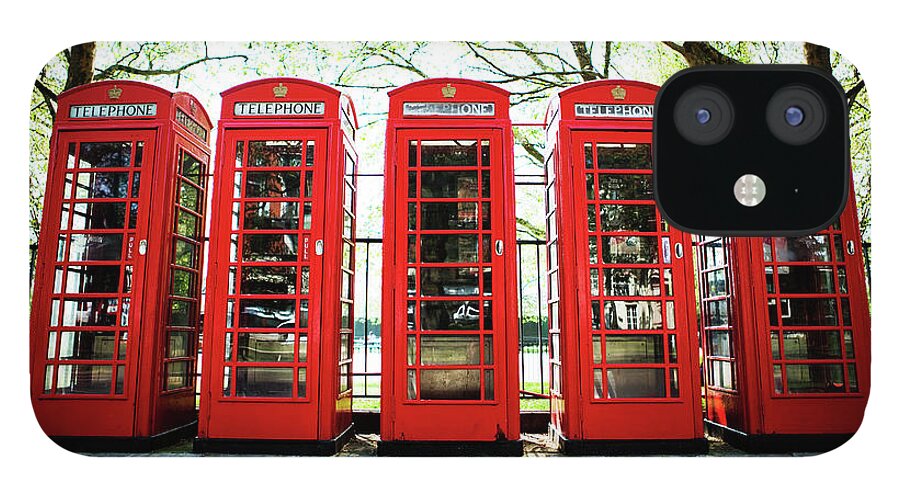 English Culture iPhone 12 Case featuring the photograph Five Red Telephone Boxes In A Line by Richard Boll