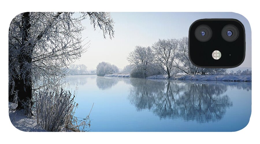 Snow iPhone 12 Case featuring the photograph Frozen Winter Landscape With Trees by Avtg