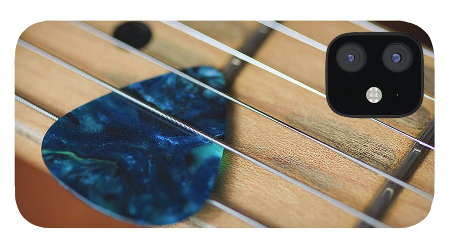 Sheet Music iPhone 12 Case featuring the photograph Guitar Strings And Plectrum by Fraser Hall