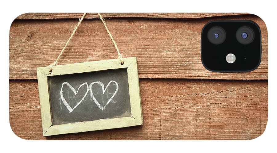 Hanging iPhone 12 Case featuring the photograph Hearts Drawn On Small Board Outdoor by Emma Innocenti
