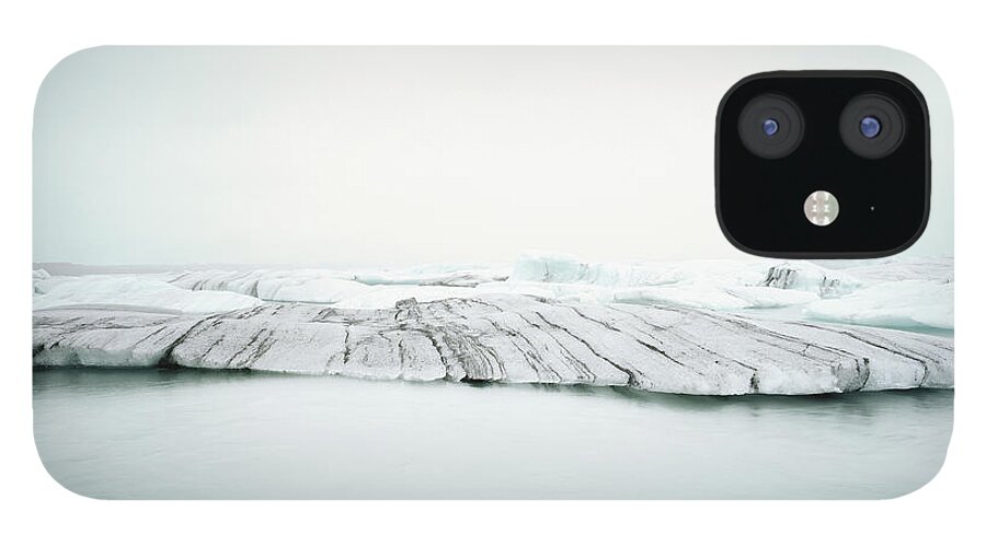 Scenics iPhone 12 Case featuring the photograph Ice Melt In Jökulsárlón, Iceland by Michael Hall