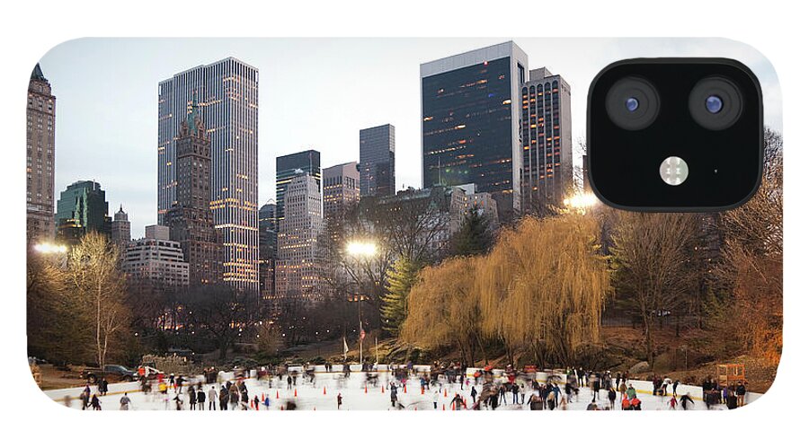 People iPhone 12 Case featuring the photograph Ice Skating In Central Park by Studiokiet