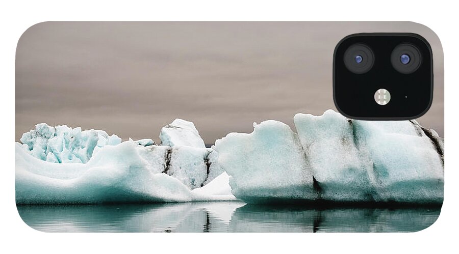Glacier Lagoon iPhone 12 Case featuring the photograph Iceberg In Water by Roine Magnusson