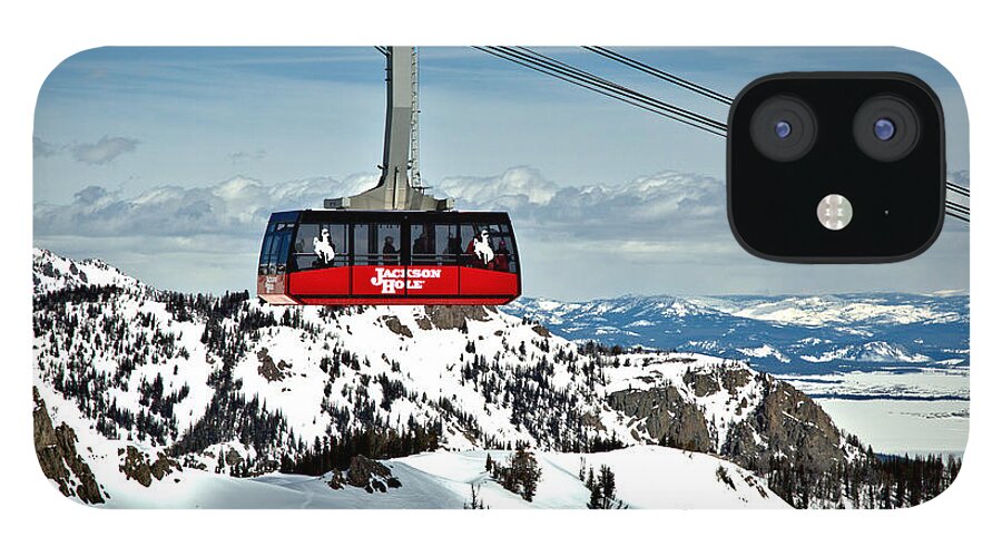 Jackson Hole Tram iPhone 12 Case featuring the photograph Jackson Hole Aerial Tram Over The Snow Caps by Adam Jewell