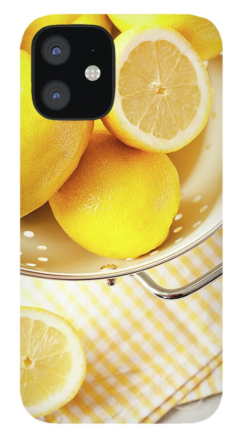 Yellow iPhone 12 Case featuring the photograph Lemon by Gmvozd