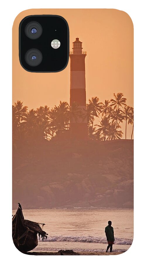 People iPhone 12 Case featuring the photograph Lone Person Walking Along Lighthouse by Anders Blomqvist