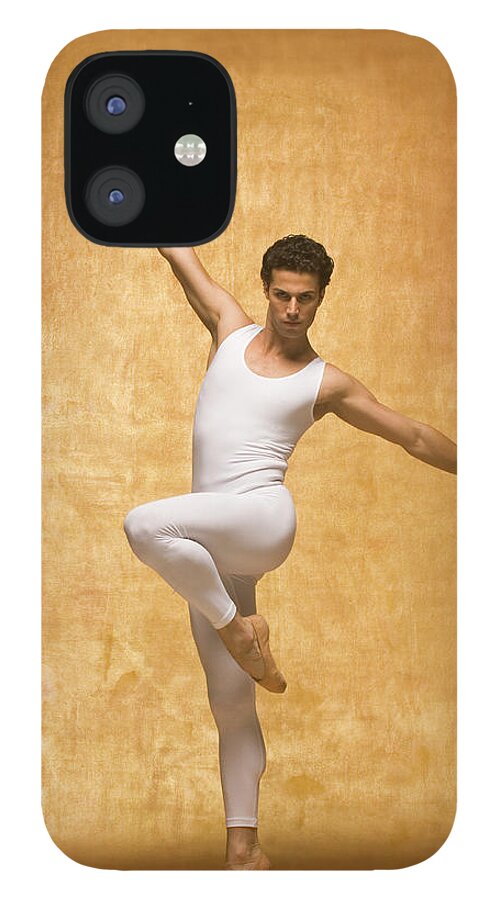 Ballet Dancer iPhone 12 Case featuring the photograph Man Performing Ballet Pose With Arms by Pm Images