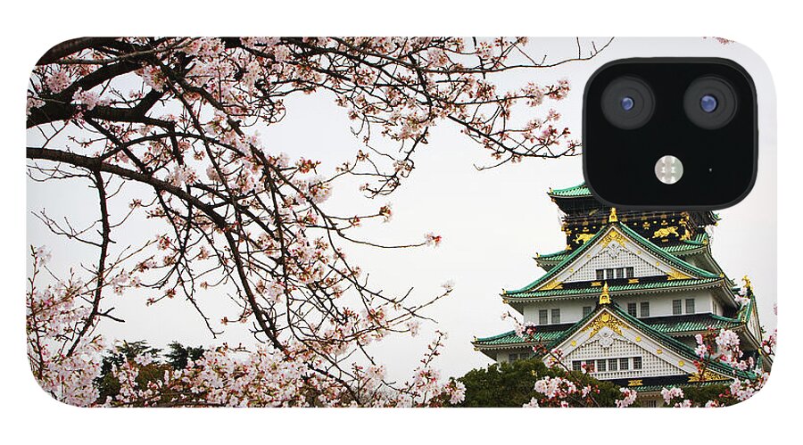 Built Structure iPhone 12 Case featuring the photograph Osaka Castle With Cherry Blossoms by John Banagan