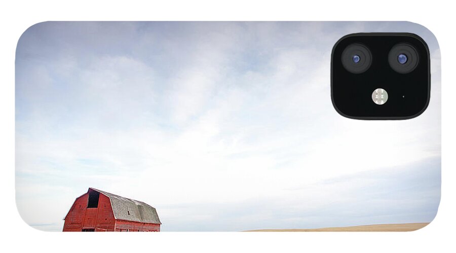 Scenics iPhone 12 Case featuring the photograph Red Barn On The Plains by Imaginegolf
