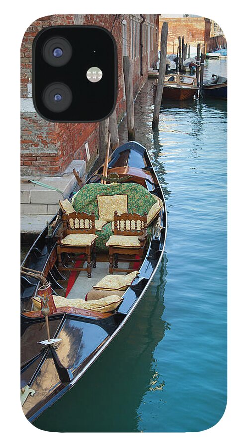 Tranquility iPhone 12 Case featuring the photograph Rowboat Docked On Urban Canal by Henglein And Steets