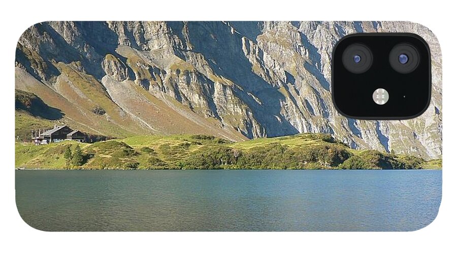 Outdoors iPhone 12 Case featuring the photograph Rowboat On Alpine Lake, Mount Titlis by Chris Lewis @chrissam42