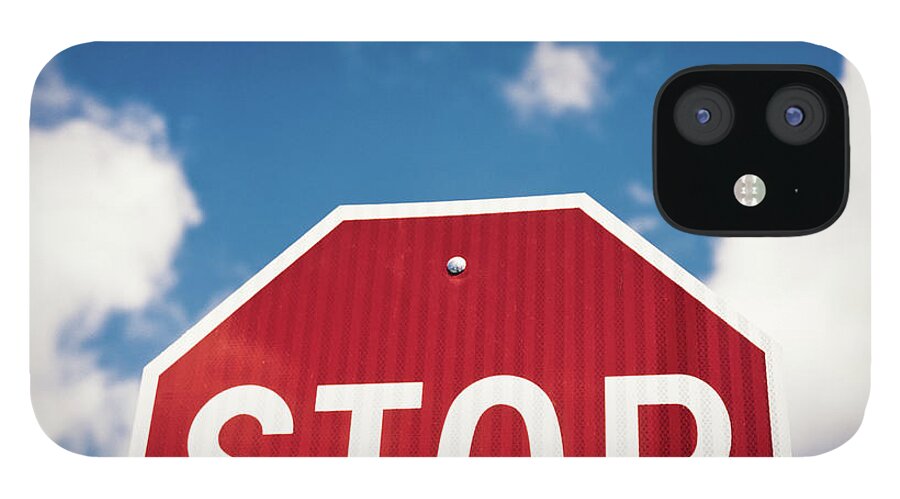 Outdoors iPhone 12 Case featuring the photograph Stop Sign Against Blue Sky And Puffy by Sean Molin - Www.seanmolin.com