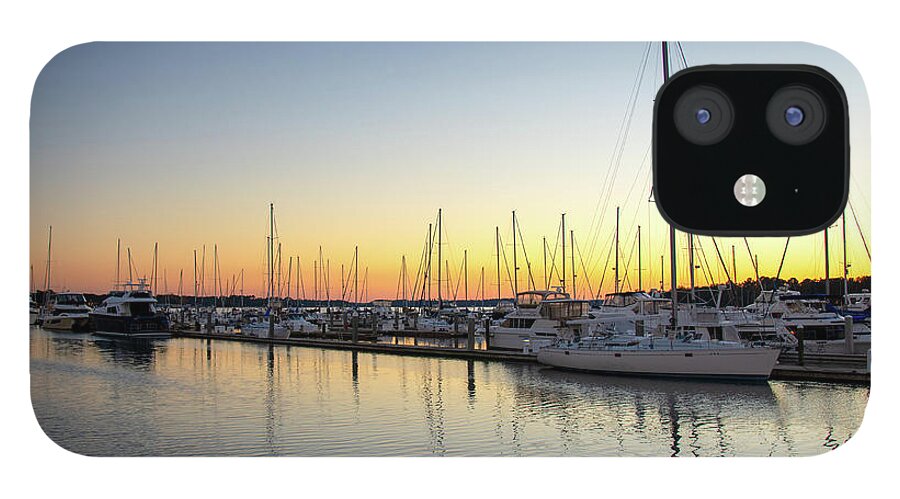 Sunset iPhone 12 Case featuring the photograph Sunset and Sailboats at Skull Creek Marina by Dennis Schmidt