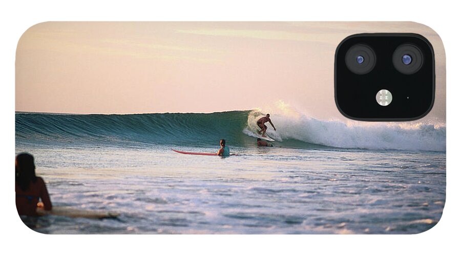 People iPhone 12 Case featuring the photograph Surfing At Avellanas Beach, Nicoya by Aaron Mccoy