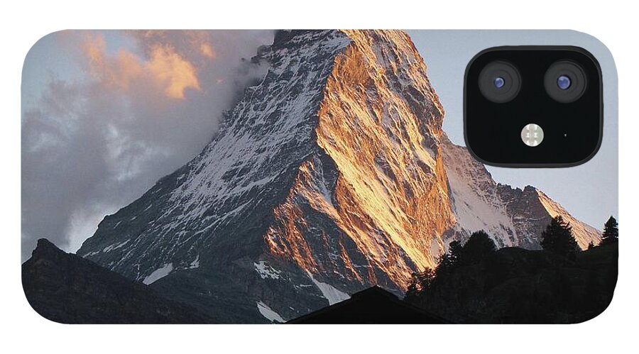 Scenics iPhone 12 Case featuring the photograph The Matterhorn At Dusk From Zermatt by Photo By Bill Birtwhistle