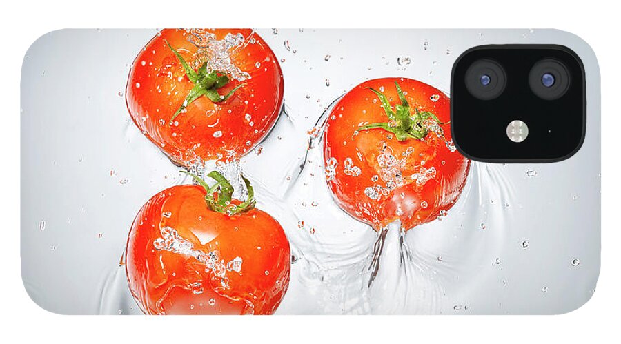 White Background iPhone 12 Case featuring the photograph Tomatoes Splashing In To Water by Chris Stein