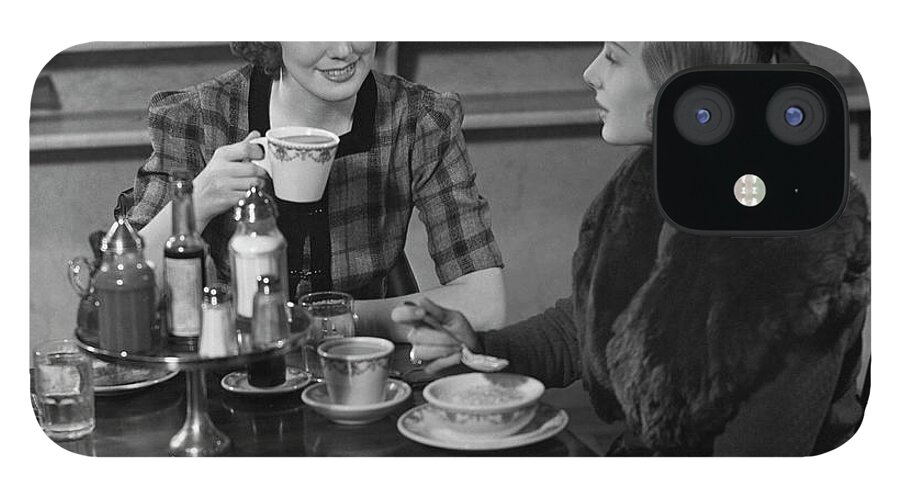 People iPhone 12 Case featuring the photograph Two Women At Restaurant by George Marks