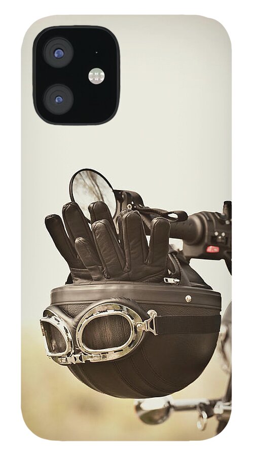 Crash Helmet iPhone 12 Case featuring the photograph Vintage Helmet And Gloves On Motorcycle by Vtwinpixel
