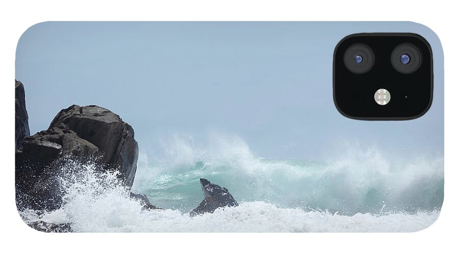 Water's Edge iPhone 12 Case featuring the photograph Wave Smashing Aginst Black Rocks In by Arturbo