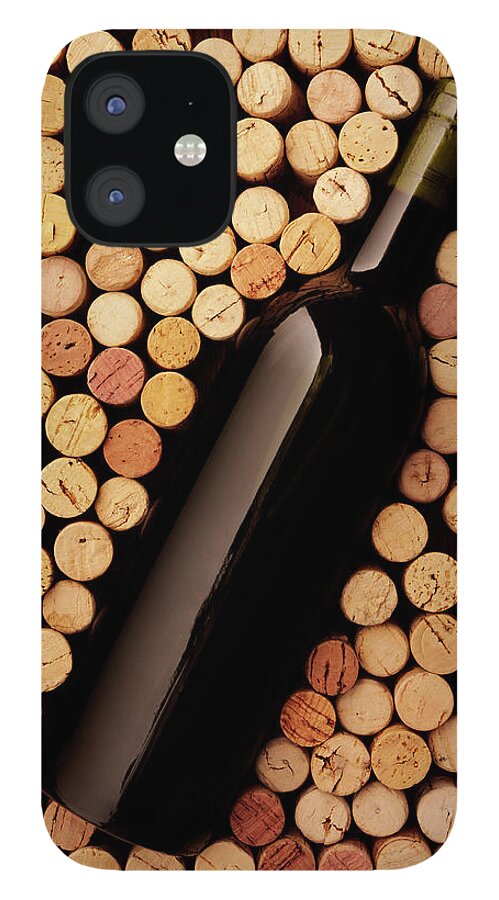 Alcohol iPhone 12 Case featuring the photograph Wine Bottle And Corks by Wragg