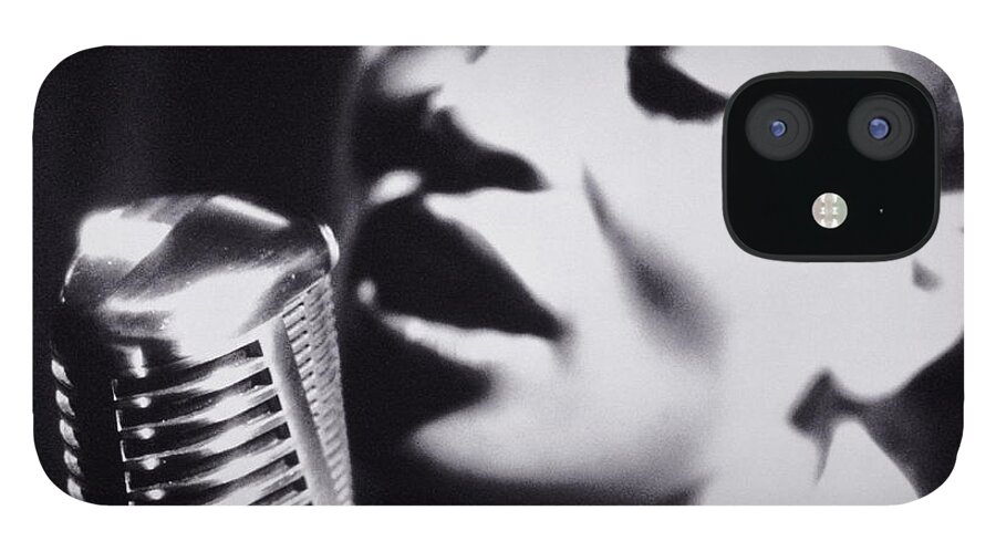 Singer iPhone 12 Case featuring the photograph Woman Singing Into Microphone, Close-up by Nick Dolding