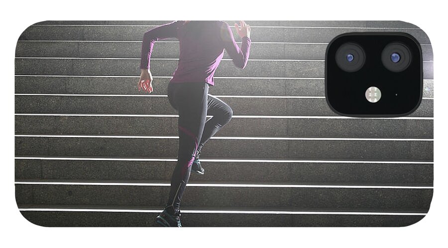 Steps iPhone 12 Case featuring the photograph Women Running On Stairs by Stanislaw Pytel