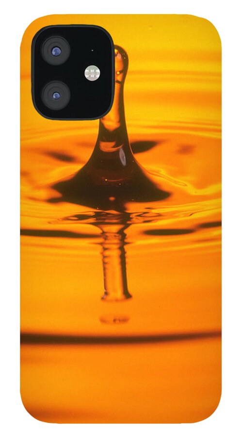 Sprinkling iPhone 12 Case featuring the photograph Yellow Water Drip by Hirkophoto