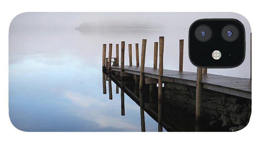 Jetty iPhone 12 Case featuring the photograph Mist over Derwent Water #1 by Bryan Attewell