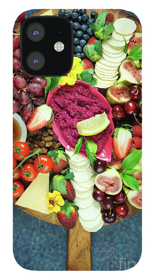 Food iPhone 12 Case featuring the photograph Cheese and fruit charcuterie dessert grazing platter on wooden board. by Milleflore Images