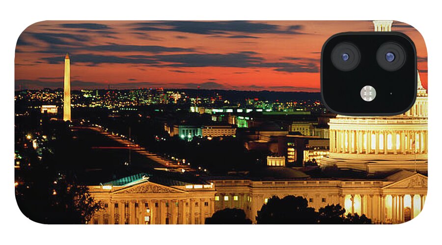 18th Century Style Building Exterior Building Structure Capitol Building City City Location Cloud Color Image Dome Dusk Federal Building High Angle View Horizontal House Of Representatives Illuminated International Landmark Legislative Building Monument Nobody North America Obelisk Outdoors Panoramic Photography Senate Sky Twilight Urban Scene Usa Washington Dc Washington Monument American Culture Architecture Authority Capital Cities Government Travel Destinations iPhone 12 Case featuring the photograph High angle view of a city lit up at dusk, Washington DC, USA by Panoramic Images