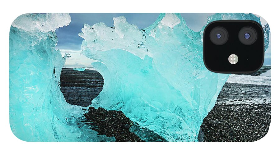 Diamond Beach iPhone 12 Case featuring the photograph Icebergs on Jokulsarlon black beach, Iceland by Neale And Judith Clark