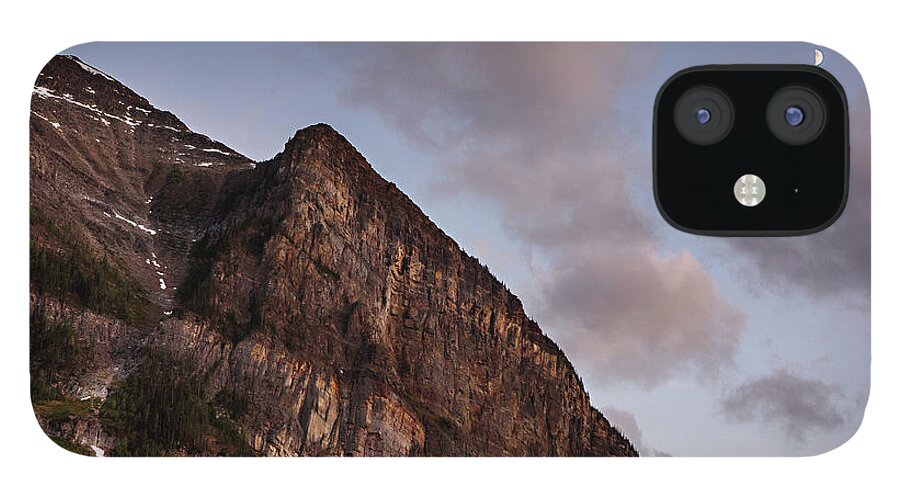 Twilight iPhone 12 Case featuring the photograph Moonlight in Lake Louise by Carolyn Ann Ryan