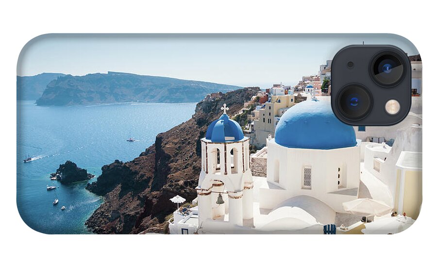 Greek Culture iPhone 13 Case featuring the photograph Blue Domed Church Along Caldera Edge In by Gollykim