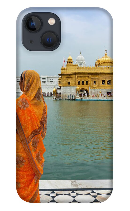 Indian Subcontinent Ethnicity iPhone 13 Case featuring the photograph Pilgrim In Golden Temple Amritsar, India by Prognone