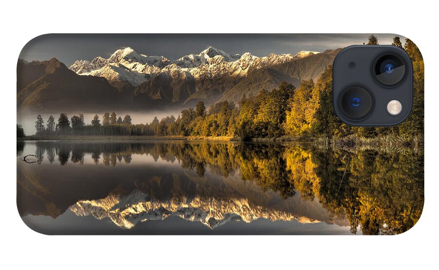 00462444 iPhone 13 Case featuring the photograph Dawn Reflection Of Lake Matheson by Colin Monteath