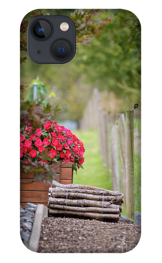 Country iPhone 13 Case featuring the photograph Red flowerd with Fende and wood billet bundle by Amanda Mohler