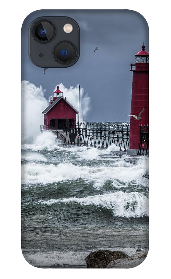 Lighthouse iPhone 13 Case featuring the photograph Storm on Lake Michigan by the Grand Haven Lighthouse with Flying Gulls by Randall Nyhof