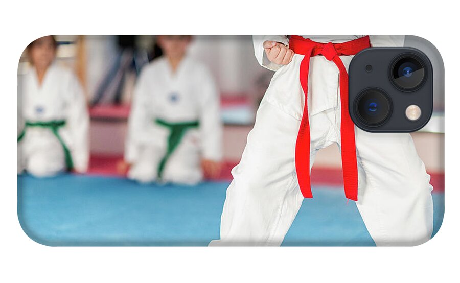 Tae Kwon Do iPhone 13 Case featuring the photograph Children In Taekwondo Class #11 by Microgen Images/science Photo Library