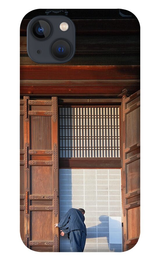Working iPhone 13 Case featuring the photograph Buddhist Monk At Kyotos Chion-in Temple by B. Tanaka