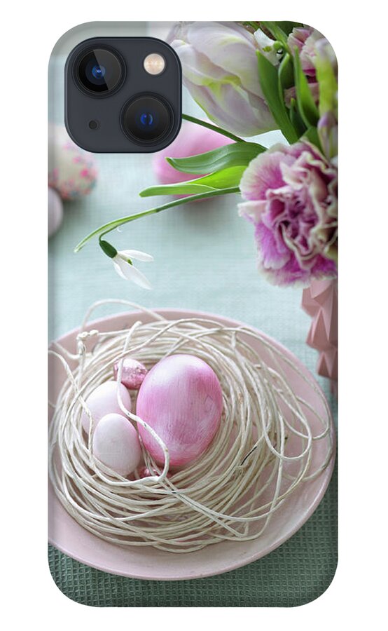 Ip_12427924 iPhone 13 Case featuring the photograph Easter Nest And Vase Of Flowers by Julia Hoersch