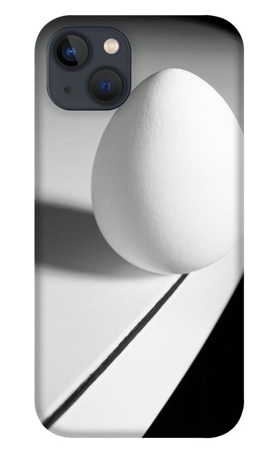 Corporate Business iPhone 13 Case featuring the photograph Egg Carefully Balancing At The Edge Of by Scotspencer