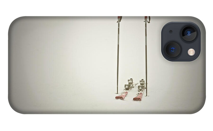 Ski Pole iPhone 13 Case featuring the photograph Empty Skis And Poles In Snow by Ross Woodhall