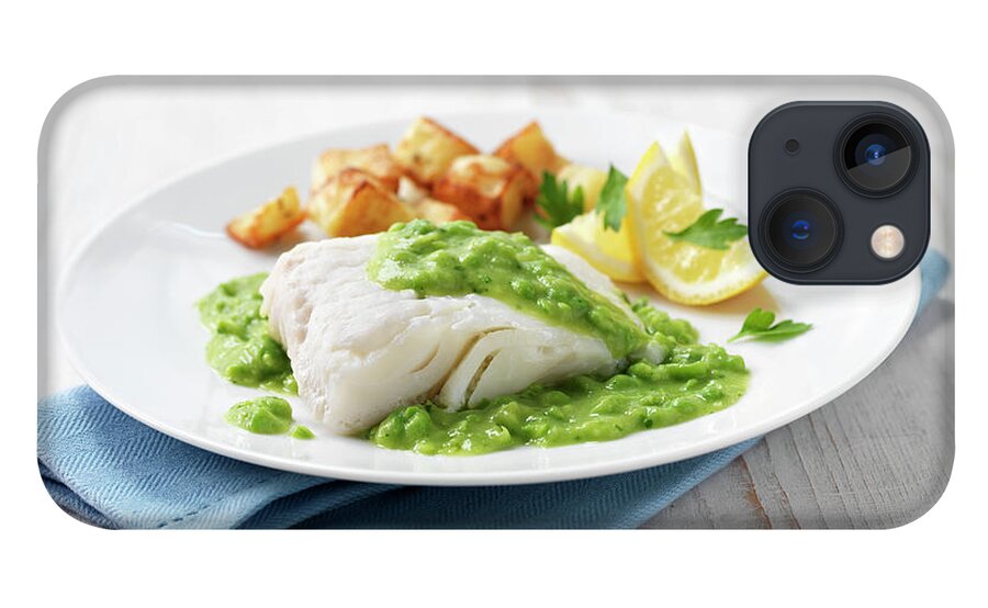 High Angle View iPhone 13 Case featuring the digital art Haddock Fillet With Fried Potatoes, Minted Pea Sauce And Lemon Wedges by Diana Miller