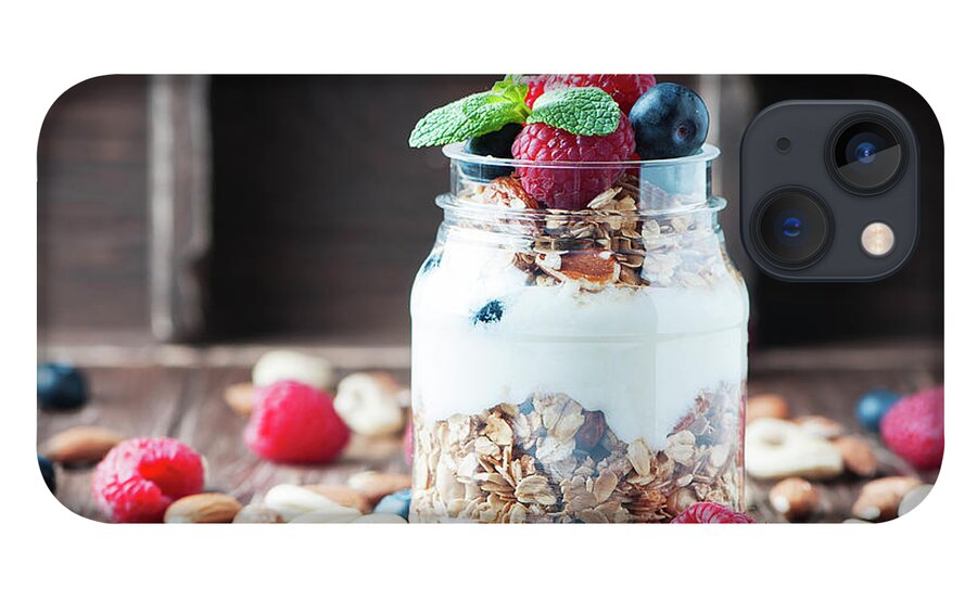 Breakfast iPhone 13 Case featuring the photograph Homemade Granola With Berry And Nuts by Oxana Denezhkina